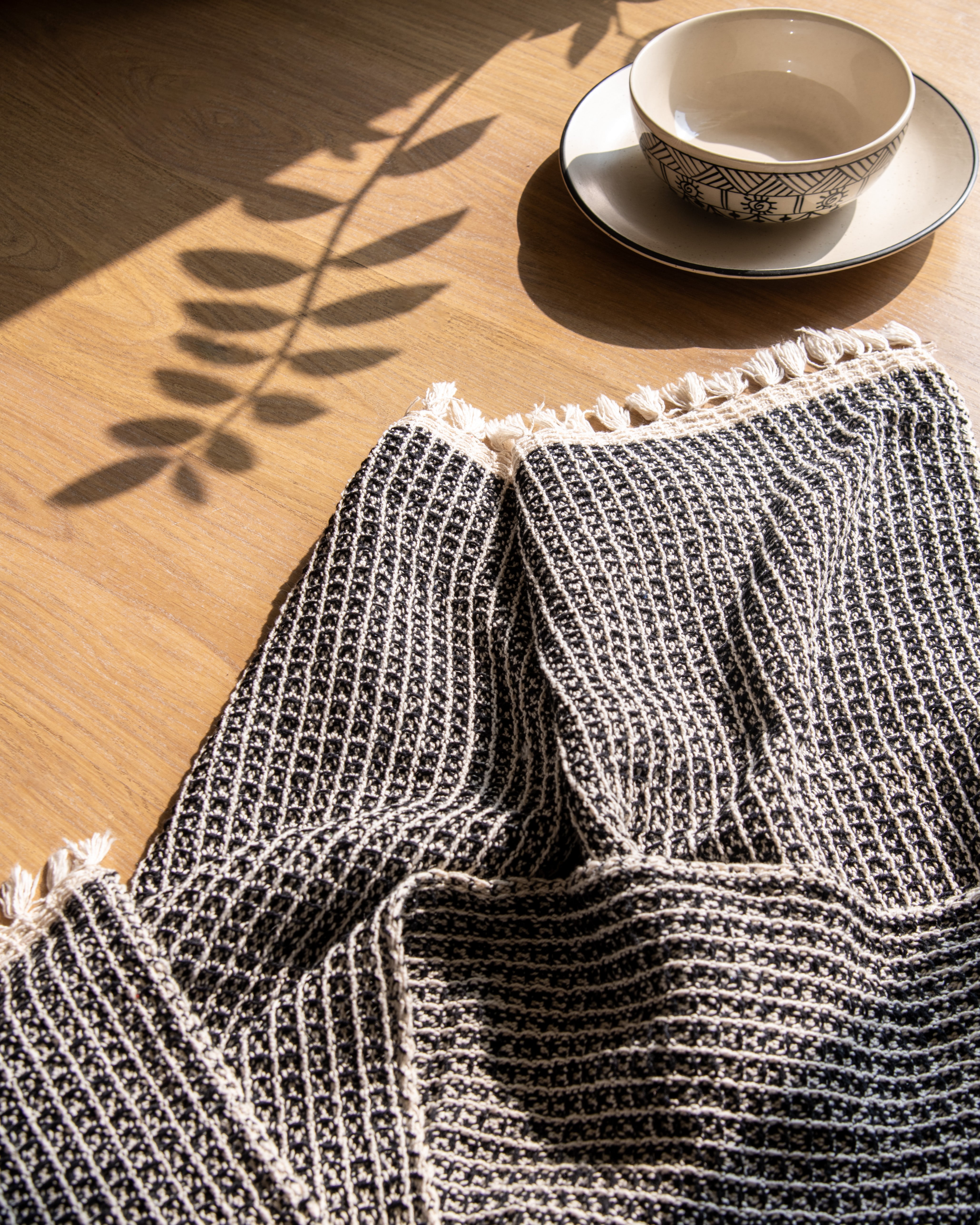 Black and Square Shaped Woven Throw